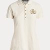 Crem Tricouri polo Ralph Lauren pentru femei cu crest din piqué Crem Tricouri polo Ralph Lauren pentru femei cu crest din piqué