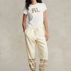 Pantaloni de sport din lână Ralph Lauren, crem, cu motiv fulgi de zăpadă Pantaloni de sport din lână Ralph Lauren, crem, cu motiv fulgi de zăpadă