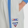 Pantaloni de sport Ralph Lauren cu dungi laterale de damă bej Pantaloni de sport Ralph Lauren cu dungi laterale de damă bej