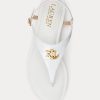 Sandale albe Ralph Lauren Ellington din piele cu relief pentru femei Sandale albe Ralph Lauren Ellington din piele cu relief pentru femei