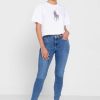 Tricouri albe Ralph Lauren cu decolteu rotund pentru femei Tricouri albe Ralph Lauren cu decolteu rotund pentru femei